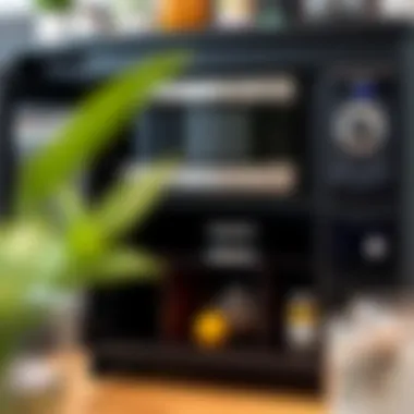 Close-up of storage options in a black microwave cart