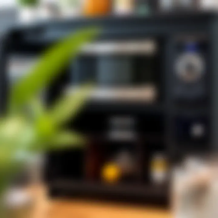 Close-up of storage options in a black microwave cart