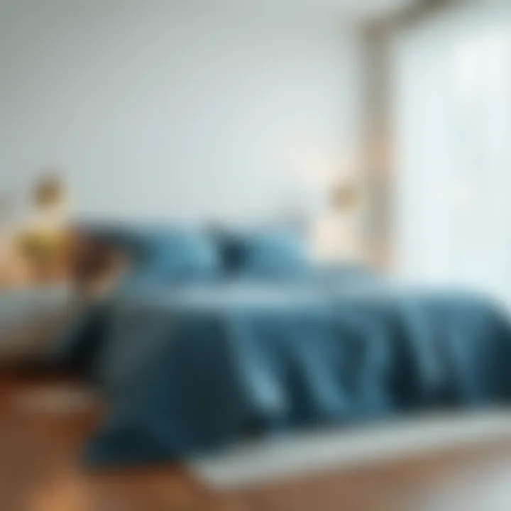 A modern bedroom with a blue bedspread, showcasing tranquility and elegance
