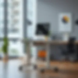 Compact sit-stand desk on wheels in a modern office setting