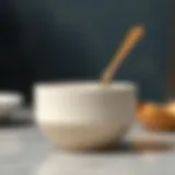 Elegant ceramic sauce container with a minimalist design