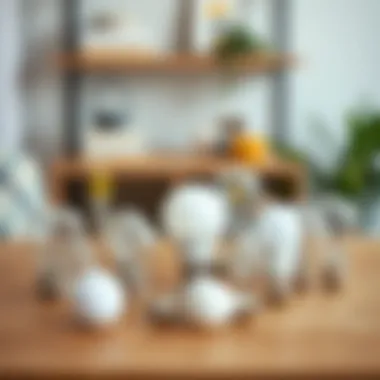 A selection of various small dimmable light bulbs displayed on a wooden table, showcasing their diversity in design and application.